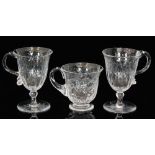 A pair of late 19th Century crystal glass punch cups the spread foot below a knopped stem to the