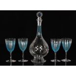 An early 20th Century continental crystal glass decanter of conical footed globe and shaft form