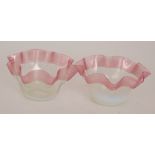 A pair of late 19th Century Stourbridge finger bowls of circular form with a wave rim,