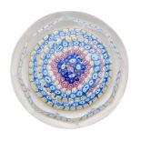An early 20th Century John Walsh Walsh paperweight with a multicoloured concentric millefiori cane