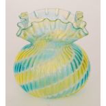 A late 19th Century Stourbridge glass vase of spherical form with tight fluted body below a