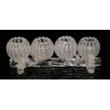 A late 19th Century Stevens & Williams clear crystal glass posy vase with four small spherical