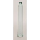 A 19th Century blown pale green bottle glass cucumber cloche with an upper hanging rim and slender