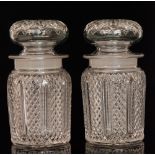 A pair of 19th Century Percival Vickers flint pressed glass cylindrical jars each with mushroom