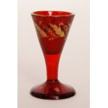 A 19th Century miniature ruby drinking glass with a conical bowl above a solid plain stem,