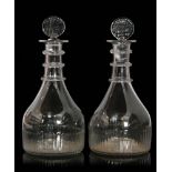 A pair of late Georgian clear crystal Cork decanters circa 1820,