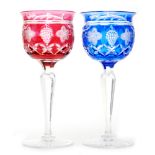 A harlequin pair of 1930s Tudor Crystal hock glasses, ovoid bowls with everted rim,