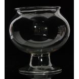 A late 18th Century clear crystal glass fish bowl of ovoid form with everted folded rim,