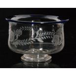 A late Georgian clear crystal bowl circa 1810 of footed ovoid form with a flared rim decorated with