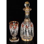 A 19th Century miniature decanter of shouldered ovoid form with collar neck and solid ball stopper,