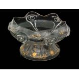 An early 20th Century Stuart & Sons clear crystal bowl of conical form with a wide wave rim,