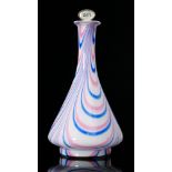 A 19th Century Nailsea style decanter of tapered conical form with tall collar neck and flat rim,