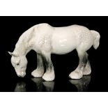 A Beswick Grazing Shire, model 1050 in dapple grey,