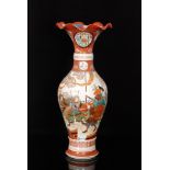 A large late 19th Century Japanese Kutani vase of baluster form with a flared neck,