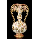 A Zsolnay Pecs twin handled Persian style vase,
