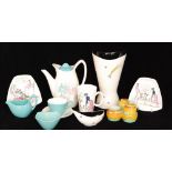 A Midwinter 'Modern Fashion Shape' coffee set decorated in the Quite Contrary pattern designed by