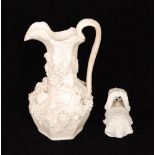 A 19th Century Parian jug decorated with bunches of grapes and grape vines, height 21cm,