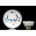 A late 18th Century Worcester blue and white teabowl and saucer decorated in the Two Quails pattern,