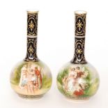 A pair of early 20th Century Vienna bottle vases each transfer decorated with scenes of a young