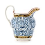 A late 18th to early 19th Century Worcester Royal Lily pattern cream jug decorated with stylised