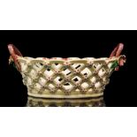 A late 18th to early 19th Century Worcester oval dessert basket with diamond diaper pierced sides,