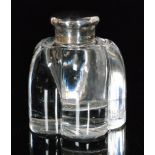 A hallmarked silver and clear glass ink well,