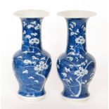 A pair of early 20th Century Chinese blue and white prunus blossom vases,
