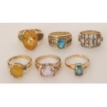 A selection of gem set rings to include kunzite, citrine, tanzanite zircon etc all mounted in 9ct,