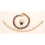 A 10ct opal bracelet formed with twenty one circular opal cabochons,