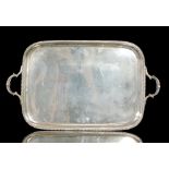 A hallmarked silver cushioned rectangular tray of plain form terminating with a gadroon border and