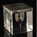 An Art Deco hallmarked silver and clear glass ink well,