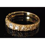 A modern hallmarked 18ct diamond half eternity ring,