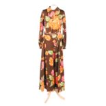 A 1970s Horrockses lady's vintage brown maxi dress with an orange and pink floral pattern,