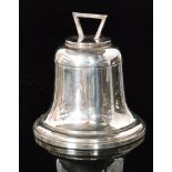 A hallmarked silver ink well of plain form modelled as a bell terminating with angular handle to