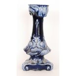 A late 19th to early 20th Century continental jardiniere pedestal with Art Nouveau stylised flowers