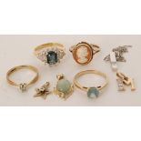 A hallmarked 9ct solitaire diamond ring, a cameo ring stamped, and two other stone set examples,