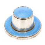 A hallmarked silver and blue guilloche enamelled ink well,