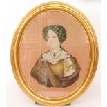 A 19th Century oval needle and bead work portrait of a lady with tightly curled hair and dressed in