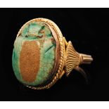 An Egyptian turquoise scarab beetle ring,
