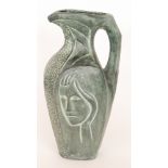 A large later 20th Century Spanish studio pottery jug decorated with an incised portrait of a lady