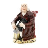 A 19th Century Staffordshire character jug modelled as George Whitfield or the Nightwatchman,