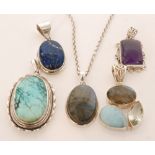 Five modern silver mounted pendants to include turquoise, lapis lazuli, amethyst,