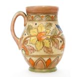 A 1930s Crown Ducal flower jug decorated in the 5983 Ankara pattern designed by Charlotte Rhead,