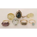 A group of six stone set rings to include citrine and obsidian and a briolette cut citrine pendant