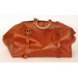 A large leather holdall bag, with embossed sign tag for Allied Dunbar, length 52cm.