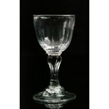 An 18th Century champagne glass circa 1755,