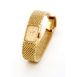 A 1960s 18ct lady's Omega wristwatch, rectangular gilt dial with gilt metal baton markers,