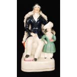 A 19th Century Staffordshire figure modelled as Prince Albert and the Prince of Wales,