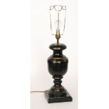 A 20th Century ebonised table lamp of turned baluster form, with gilt painted highlights,