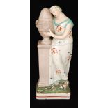 An early 19th Century Staffordshire pearl ware figure modelled as Andromache weeping over the ashes